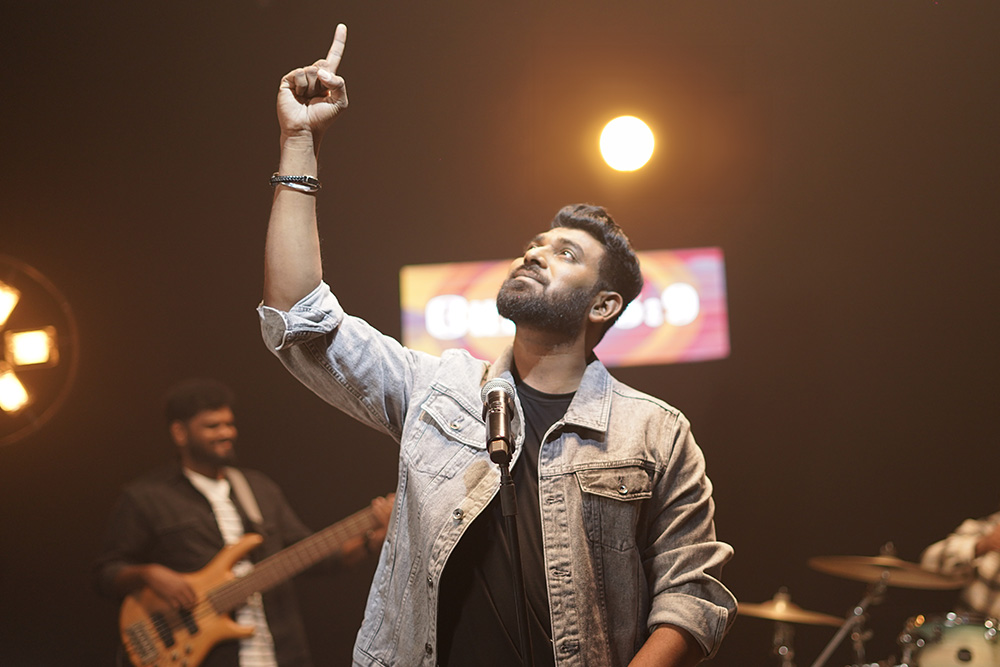Winston David Prince Tamil Christian singer songwriter official portrait smiling in studio